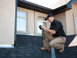 Home inspector on Roof - Homes for Sale in Calgary
